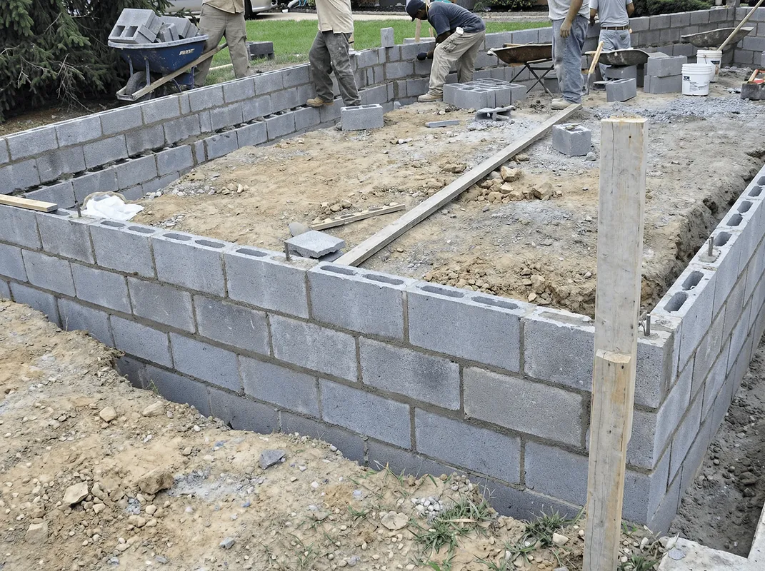 Professionals building a foundation with blocks in Syracuse, NY